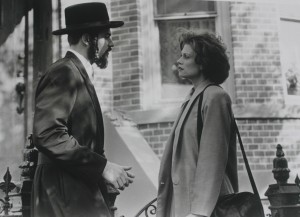 Still from A Stranger Among Us, starring Melanie Griffith and Eric Thal. The film was written and produced by Robert J. Avrech and directed by Sidney Lumet.
