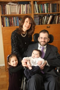 The couple with two of their children. The younger child seen above was born soon after the accident. Photo: Issie Scarowsky