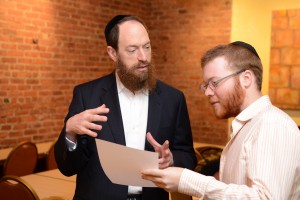 Shmuel Goldman (left), former COO of Intrasphere Technologies Inc, mentors Bentzion Plotkin as part of CHYE’s mentoring program. Photo courtesy of Rabbi Yehoshua Werde of CHYE 
