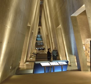 The museum, designed to personalize the experience of the Holocaust, features a central walkway with exhibition galleries on each side.