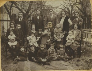 The Kurzweil family in Dobromil, Poland (ca. 1925). Fourteen out of the twenty-one people in the photo were murdered during the Holocaust. Arthur Kurzweil’s great-grandfather, Avraham Abisch Kurzweil, is in the center; Arthur's father, Chaim Shaul (Saul) Kurzweil is sitting on the ground, second from right. Photo courtesy of Arthur Kurzweil 