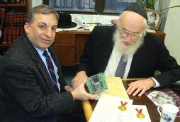 OU Posek Rabbi Yisroel Belsky with Mr. Schmutter.