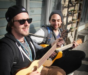 Birthright participants Kurt Gray and Ben Spielberg playing their instruments outside the Shuk in Jerusalem. Photos: Laura Bergstein